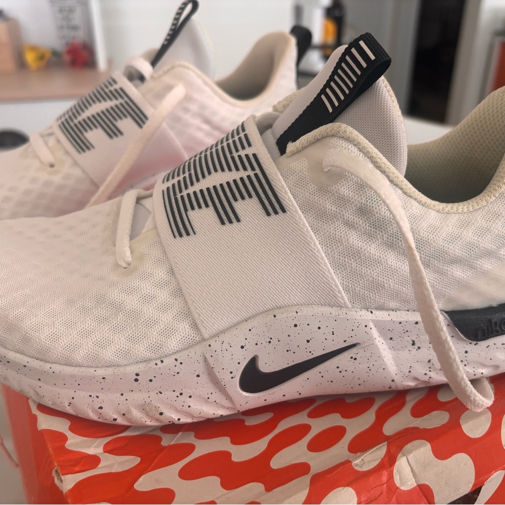 Nike Women’s Renew White and Black Sneakers